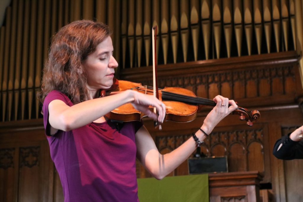 Ms. Leah playing violin at the first unitarian church