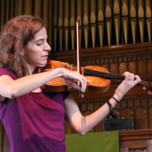 Ms. Leah playing violin at the first unitarian church